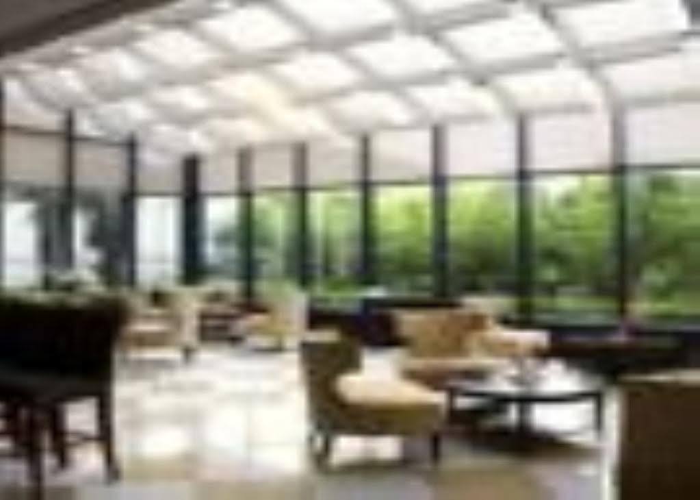 Ramada Plaza Sino-Bay Shanghai Fengxian Экстерьер фото